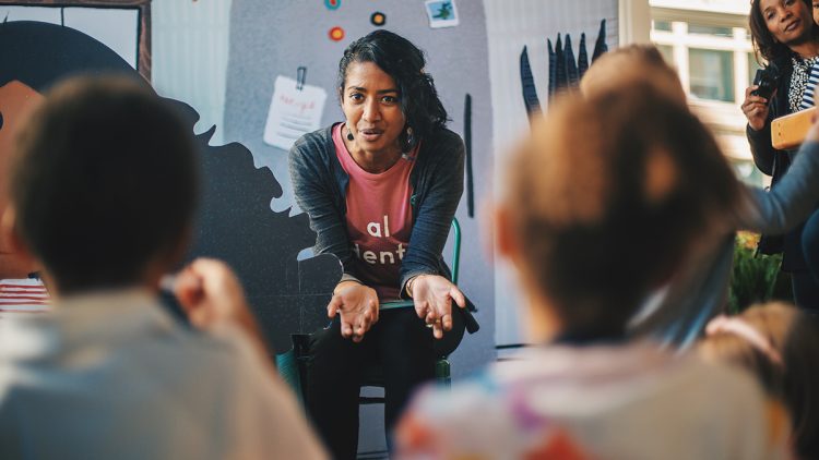 Sarah Thomas reading to children