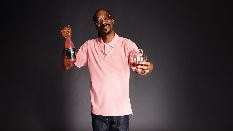 Snoop Dog holding his wine