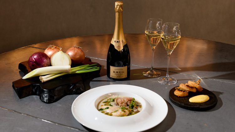 Champagne and food on a table