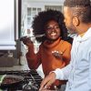 A couple cooking in the kitchen